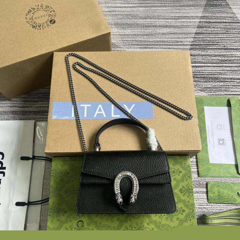 G*u*i top handle bags